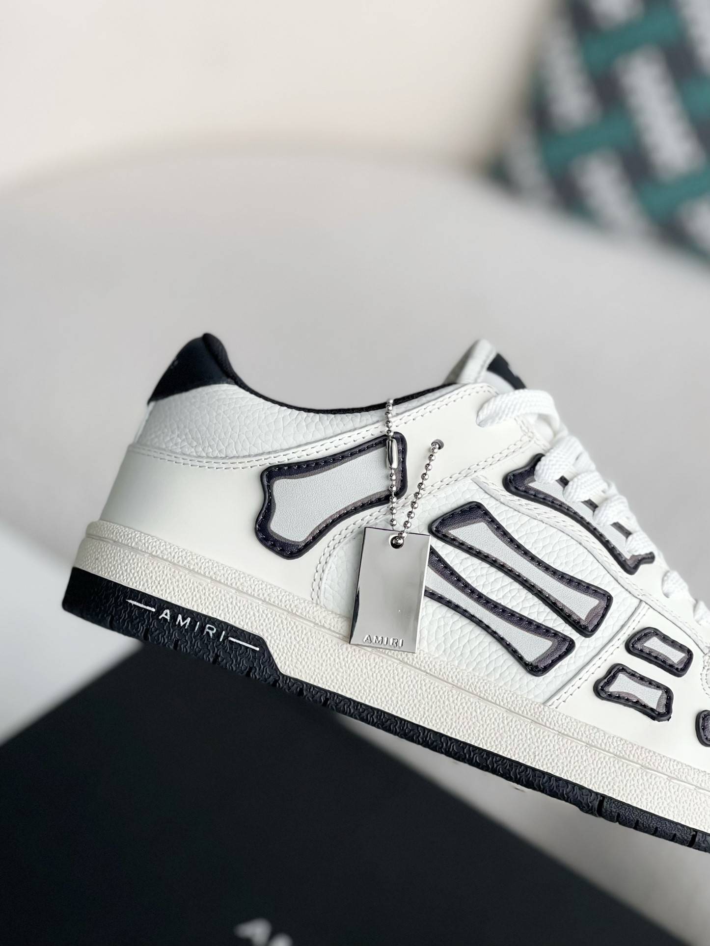 A*RI Bone Sneakers