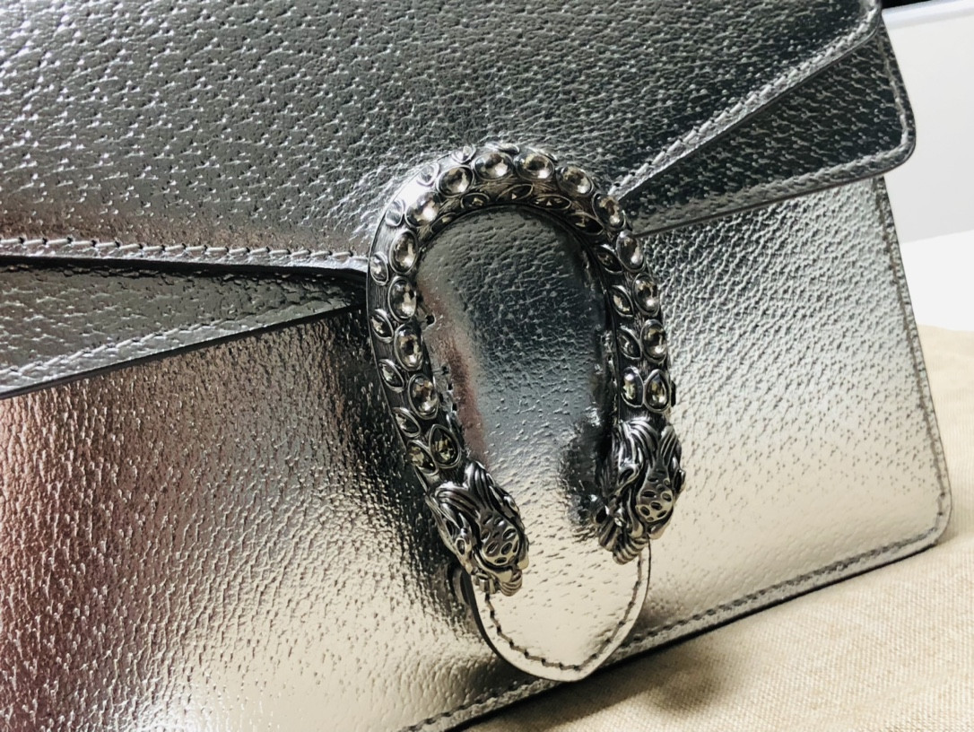 G*u*i dionysus bag